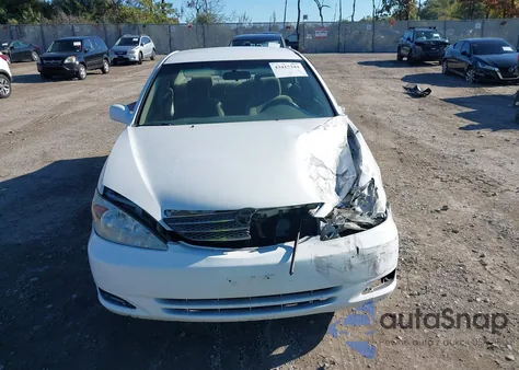 2002 Toyota Camry Le from USA, damaged, VIN 4T1BE32K82U042045